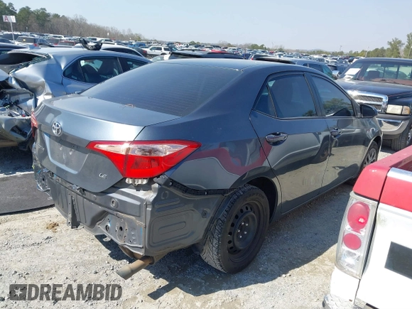2019 Toyota Corolla L with VIN 2T1BURHE4KC134729, listed as a IAAI auction lot 41779629 with 240,685 mi miles. Bid and sale history available at carsss.com. Image 4.