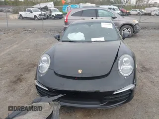 2014 Porsche 911 Carrera with VIN WP0AA2A92ES106536, listed as a IAAI auction lot 42048411 with 108,216 mi miles and . Bid and sale history available at DreamBid. Image 12.