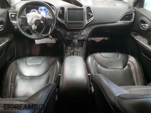 2019 Jeep Cherokee Trailhawk Elite с VIN 1C4PJMBN6KD162156, выставлен на аукционе Copart как лот 83041704 с пробегом 100 616 миль миль и Списание • Salvage title. История ставок и продаж доступна на DreamBid. Изображение 8.