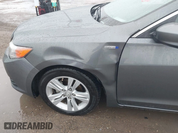 2014 Acura ILX Hybrid Technology z VIN 19VDE3F75EE300312, wystawiony jako IAAI lot #41608572 z przebiegiem 126 974 mil mil oraz . Historia ofert i sprzedaży dostępna na DreamBid. Obrazek 18.