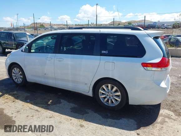 2011 Toyota Sienna XLE with VIN 5TDDK3DCXBS029961, listed as a IAAI auction lot 42228356 with 251,571 mi miles and . Bid and sale history available at DreamBid. Image 14.