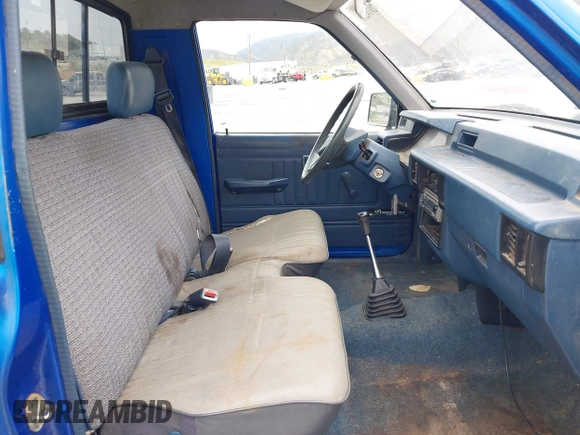 1990 Mitsubishi Mighty Max with VIN JA7FL24W8LP030657, listed as a IAAI auction lot 42014231 with 376,787 mi miles and . Bid and sale history available at DreamBid. Image 5.
