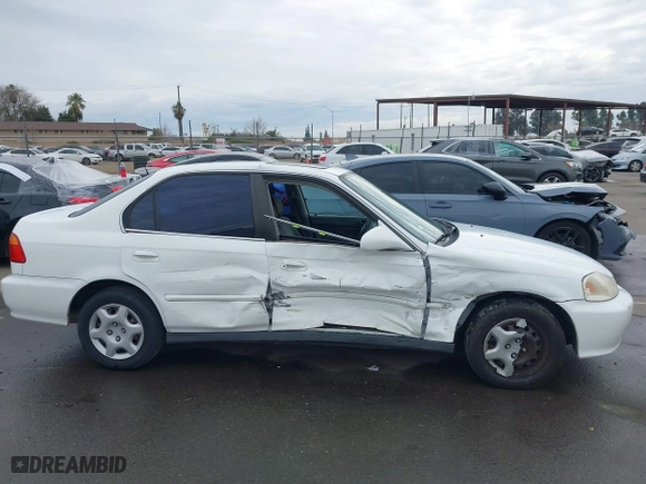 1999 Honda Civic EX with VIN 2HGEJ8648XH526377, listed as a IAAI auction lot 41517330 with 167,375 mi miles. Bid and sale history available at carsss.com. Image 13.