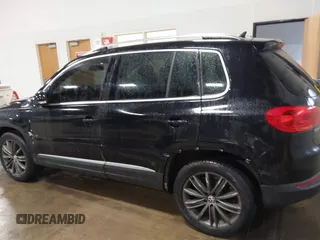 2013 Volkswagen Tiguan SE z VIN WVGBV7AX3DW508802, wystawiony jako IAAI lot #41471406 z przebiegiem 102 426 mil mil oraz . Historia ofert i sprzedaży dostępna na DreamBid. Obrazek 14.