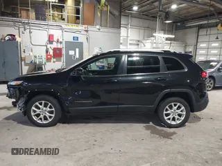 2015 Jeep Cherokee Latitude with VIN 1C4PJMCB5FW768854, listed as a IAAI auction lot 41246213 with 131,112 mi miles. Bid and sale history available at carsss.com. Image 14.