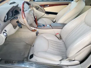 2009 Mercedes-Benz SL 550 z VIN WDBSK71F69F142599, wystawiony jako Copart lot #50241095 z przebiegiem 58 416 mil mil oraz Szkoda całkowita • Salvage title. Historia ofert i sprzedaży dostępna na DreamBid. Obrazek 7.