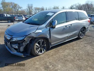 2018 Honda Odyssey Elite z VIN 5FNRL6H91JB070355, wystawiony jako IAAI lot #41975916 z przebiegiem 147 022 mil mil oraz . Historia ofert i sprzedaży dostępna na DreamBid. Obrazek 2.