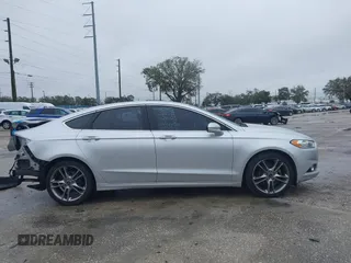2015 Ford Fusion Titanium with VIN 3FA6P0K94FR120318, listed as a IAAI auction lot 41380325 with 137,910 mi miles. Bid and sale history available at carsss.com. Image 14.