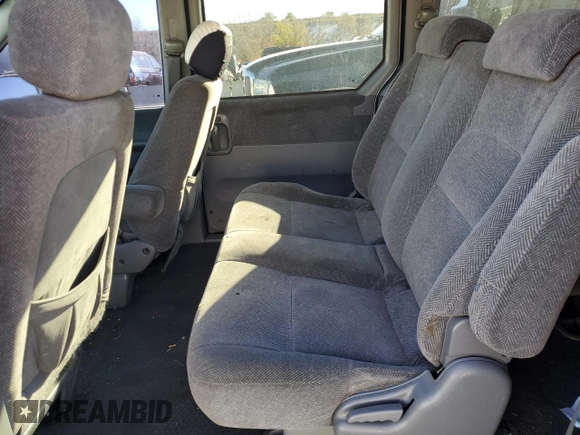 2003 Kia Sedona LX with VIN KNDUP131236371153, listed as a Copart auction lot 80989974 with 205,181 mi miles and Salvage Title. Bid and sale history available at carsss.com. Image 11.