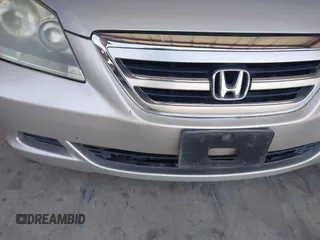 2005 Honda Odyssey EX-L with VIN 5FNRL38705B106488, listed as a IAAI auction lot 42545141 with 199,619 mi miles and . Bid and sale history available at DreamBid. Image 13.