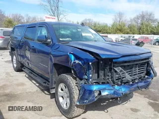 2017 Chevrolet Silverado 1500 LT with VIN 3GCUKREC5HG363503, listed as a IAAI auction lot 41833304 with 133,130 mi miles and . Bid and sale history available at DreamBid. Image 6.
