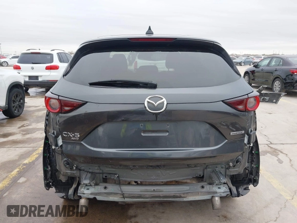 2021 Mazda CX-5 Touring with VIN JM3KFBCM0M0342210, listed as a IAAI auction lot 41236013 with 96,012 mi miles. Bid and sale history available at carsss.com. Image 17.