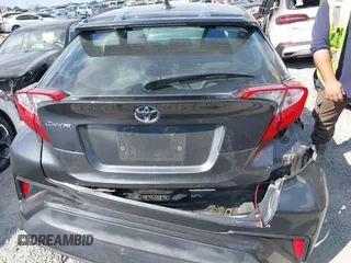 2021 Toyota C-HR LE with VIN NMTKHMBX3MR128835, listed as a IAAI auction lot 41891619 with 57,744 mi miles and . Bid and sale history available at DreamBid. Image 16.