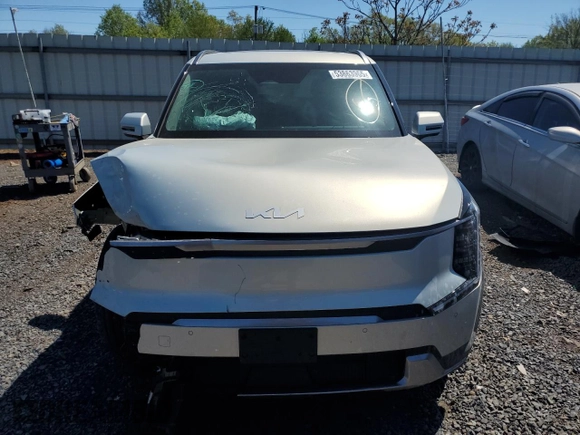 2024 Kia EV9 Wind z VIN KNDAFFS57R6050905, wystawiony jako Copart lot #53863965 z przebiegiem 10 210 mil mil oraz Szkoda całkowita • Salvage title. Historia ofert i sprzedaży dostępna na DreamBid. Obrazek 5.