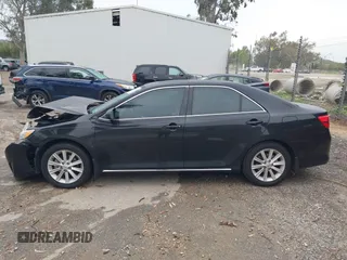 2014 Toyota Camry SE with VIN 4T1BK1FK8EU539138, listed as a IAAI auction lot 41802302 with 91,205 mi miles. Bid and sale history available at carsss.com. Image 14.
