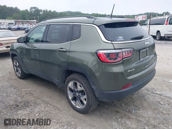 2020 Jeep Compass Limited with VIN 3C4NJDCB2LT127296, listed as a IAAI auction lot 42555235 with 105,259 mi miles and . Bid and sale history available at DreamBid. Image 3.