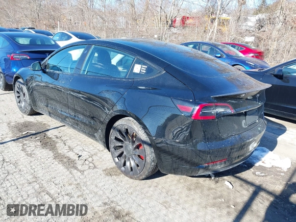 2021 Tesla Model 3 Performance with VIN 5YJ3E1EC5MF090518, listed as a IAAI auction lot 38775658 with 14,118 mi miles and . Bid and sale history available at carsss.com. Image 3.