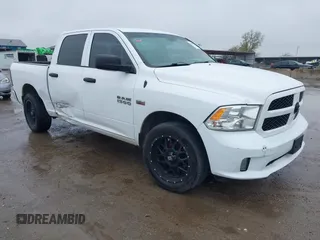 2015 Ram 1500 Express z VIN 1C6RR6KT4FS553990, wystawiony jako IAAI lot #41288184 z przebiegiem 130 317 mil mil oraz . Historia ofert i sprzedaży dostępna na DreamBid. Obrazek 1.