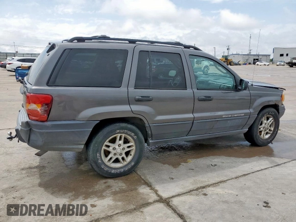 2003 Jeep Grand Cherokee Laredo with VIN 1J4GW48SX3C569087, listed as a Copart auction lot 55941035 with Not provided miles and Salvage title. Bid and sale history available at DreamBid. Image 3.