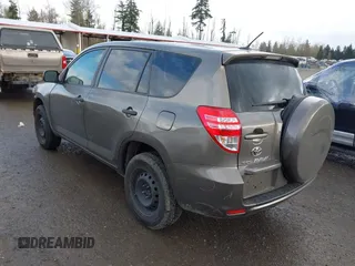 2009 Toyota RAV4 with VIN JTMZF33V995001985, listed as a IAAI auction lot 41932410 with 113,713 mi miles. Bid and sale history available at carsss.com. Image 3.