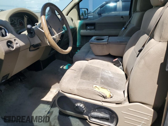 2006 Ford F-150 STX with VIN 1FTRX12W16FB16422, listed as a Copart auction lot 62468955 with 203,721 mi miles and Salvage title. Bid and sale history available at DreamBid. Image 7.