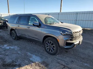 2022 Chevrolet Suburban Z71 with VIN 1GNSKDKD4NR255061, listed as a Copart auction lot 85507694 with 107,856 mi miles and Salvage Title. Bid and sale history available at carsss.com. Image 4.