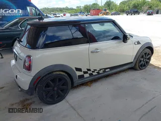 2007 MINI Hardtop with VIN WMWMF33557TL67653, listed as a IAAI auction lot 42581219 with 147,115 mi miles and . Bid and sale history available at DreamBid. Image 4.