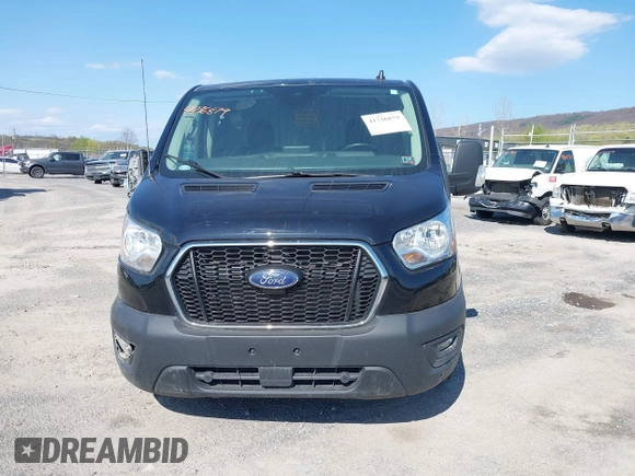 2021 Ford Transit Cargo with VIN 1FTYE1Y85MKA34465, listed as a IAAI auction lot 41736879 with 77,215 mi miles. Bid and sale history available at carsss.com. Image 12.