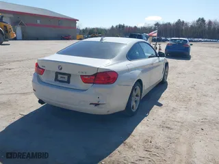 2014 BMW 4 Series 428i xDrive with VIN WBA3N5C55EK196898, listed as a IAAI auction lot 42112580 with 184,381 mi miles. Bid and sale history available at carsss.com. Image 4.
