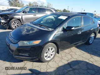 2010 Honda Insight EX with VIN JHMZE2H74AS012517, listed as a IAAI auction lot 41886588 with 227,428 mi miles and . Bid and sale history available at DreamBid. Image 2.