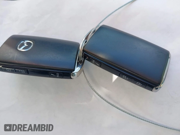 2022 Mazda CX-30 S Select z VIN 3MVDMBBL0NM415511, wystawiony jako IAAI lot #41513247 z przebiegiem Nie podano mil oraz . Historia ofert i sprzedaży dostępna na DreamBid. Obrazek 11.