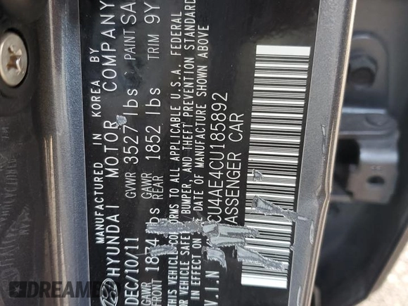 2012 Hyundai Accent GLS z VIN KMHCU4AE4CU185892, wystawiony jako Copart lot #52803675 z przebiegiem 168 792 mil mil oraz Szkoda całkowita • Salvage title. Historia ofert i sprzedaży dostępna na DreamBid. Obrazek 12.