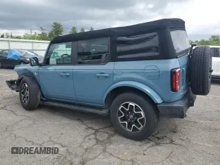 2023 Ford Bronco z VIN 1FMEE5DP9PLB17477, wystawiony jako Copart lot #58829615 z przebiegiem 22 069 mil mil oraz Szkoda całkowita • Salvage title. Historia ofert i sprzedaży dostępna na DreamBid. Obrazek 2.