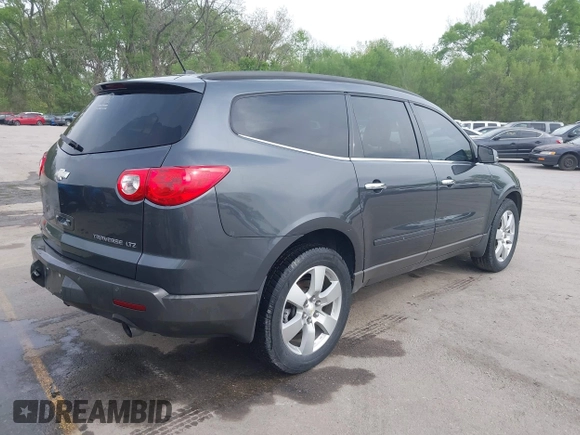 2011 Chevrolet Traverse LTZ with VIN 1GNKVLED2BJ211115, listed as a IAAI auction lot 42044255 with 275,653 mi miles and . Bid and sale history available at DreamBid. Image 4.