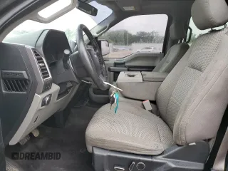 2015 Ford F-150 XLT с VIN 1FTEW1EG9FKE09398, выставлен на аукционе Copart как лот 60234065 с пробегом 128 317 миль миль и Списание • Salvage title. История ставок и продаж доступна на DreamBid. Изображение 7.