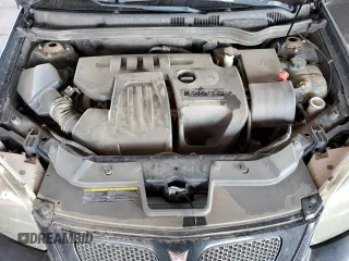 2009 Pontiac G5 z VIN 1G2AS18H797189799, wystawiony jako Copart lot #57909205 z przebiegiem 164 862 mil mil oraz Szkoda całkowita • Salvage title. Historia ofert i sprzedaży dostępna na DreamBid. Obrazek 11.