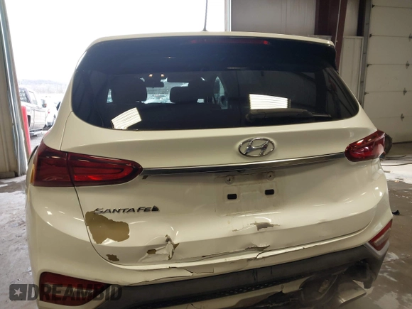 2019 Hyundai Santa Fe SE with VIN 5NMS23AD1KH063472, listed as a IAAI auction lot 41375650 with 64,496 mi miles and . Bid and sale history available at DreamBid. Image 17.