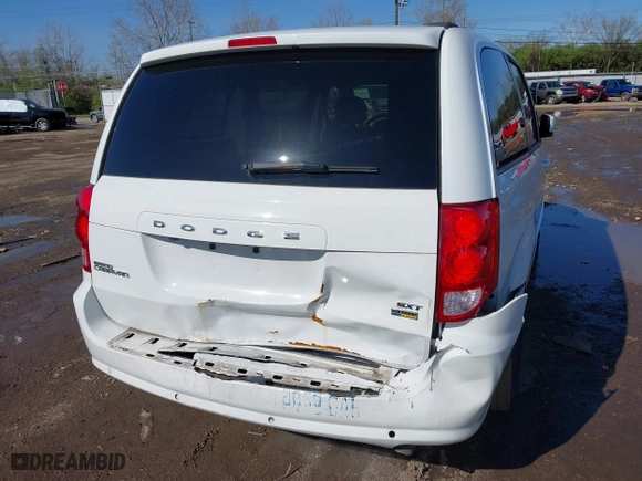 2016 Dodge Grand Caravan SXT with VIN 2C4RDGCG2GR390001, listed as a IAAI auction lot 41943622 with 127,328 mi miles. Bid and sale history available at carsss.com. Image 16.