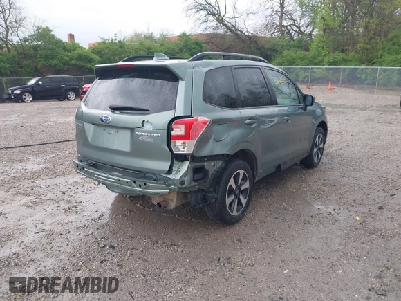 2018 Subaru Forester Premium with VIN JF2SJAEC5JH434174, listed as a IAAI auction lot 42106434 with 79,656 mi miles and . Bid and sale history available at DreamBid. Image 4.