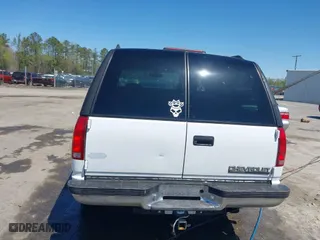 1997 Chevrolet Tahoe with VIN 1GNEK13R8VJ338626, listed as a IAAI auction lot 41976126 with 163,263 mi miles. Bid and sale history available at carsss.com. Image 16.