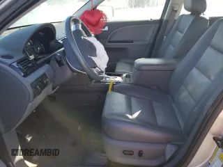 2007 Mercury Montego Premier z VIN 1MEHM42117G604211, wystawiony jako Copart lot #79867734 z przebiegiem 69 585 mil mil oraz Szkoda całkowita • Salvage title. Historia ofert i sprzedaży dostępna na DreamBid. Obrazek 7.