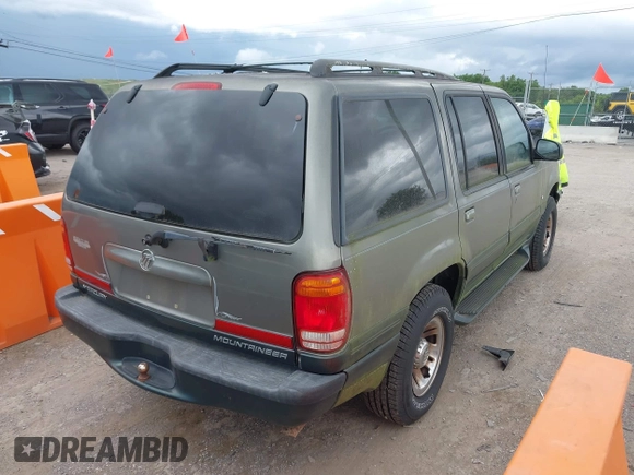 1999 Mercury Mountaineer with VIN 4M2DU55P4XUJ17716, listed as a IAAI auction lot 42488248 with 317,477 mi miles and . Bid and sale history available at DreamBid. Image 4.