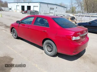 2012 Toyota Corolla L with VIN 5YFBU4EE4CP059104, listed as a IAAI auction lot 42124080 with 336,674 mi miles. Bid and sale history available at carsss.com. Image 3.