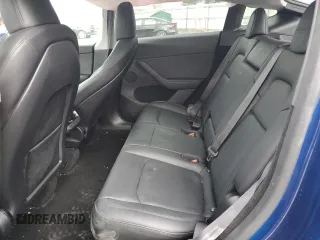 2024 Tesla Model Y Performance z VIN 7SAYGDEF6RA268195, wystawiony jako Copart lot #53211075 z przebiegiem Nie podano mil oraz Szkoda całkowita • Salvage title. Historia ofert i sprzedaży dostępna na DreamBid. Obrazek 11.