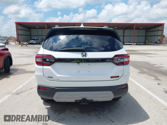2024 Honda Pilot TrailSport z VIN 5FNYG1H6XRB004763, wystawiony jako IAAI lot #42237606 z przebiegiem 14 819 mil mil oraz . Historia ofert i sprzedaży dostępna na DreamBid. Obrazek 16.