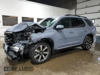 2023 Honda Pilot Elite with VIN 5FNYG1H89PB043021, listed as a Copart auction lot 51522675 with 27,465 mi miles and Salvage Title. Bid and sale history available at carsss.com. Image 1.
