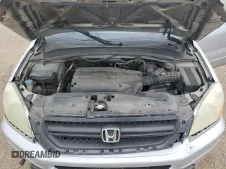 2003 Honda Pilot EX z VIN 2HKYF18583H515617, wystawiony jako Copart lot #55143045 z przebiegiem 175 976 mil mil oraz Szkoda całkowita • Salvage title. Historia ofert i sprzedaży dostępna na DreamBid. Obrazek 11.