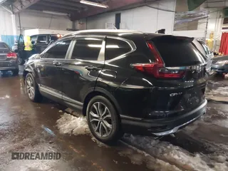 2020 Honda CR-V Touring with VIN 2HKRW2H94LH663650, listed as a IAAI auction lot 41570549 with 29,571 mi miles and . Bid and sale history available at DreamBid. Image 3.