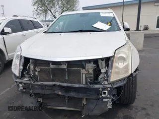 2012 Cadillac SRX Premium Collection с VIN 3GYFNCE33CS554561, выставлен на аукционе IAAI как лот 42081827 с пробегом 132 837 миль миль и . История ставок и продаж доступна на DreamBid. Изображение 13.