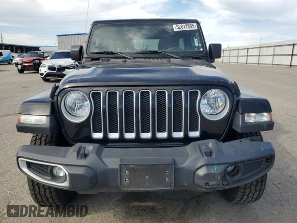 2019 Jeep Wrangler Unlimited Sahara z VIN 1C4HJXEN0KW588687, wystawiony jako Copart lot #52812895 z przebiegiem 91 486 mil mil oraz Szkoda całkowita • Salvage title. Historia ofert i sprzedaży dostępna na DreamBid. Obrazek 5.
